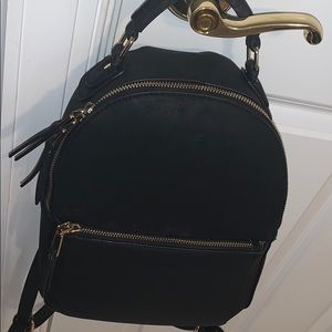 Black backpack purse